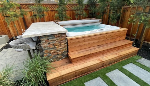 backyard with a hot tub